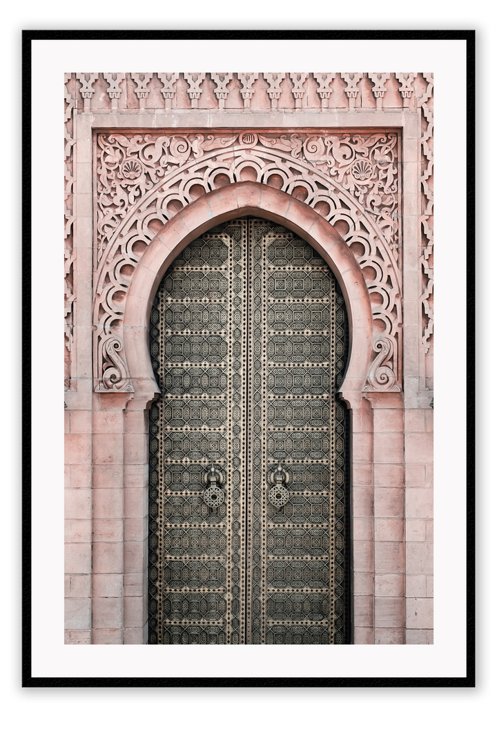 A classic morrocan architecture wall art with a pink door front and great relief carving details.