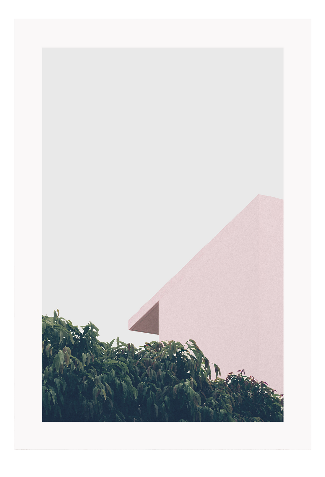 A minimal photography print peaceful wall art with pink roof, green trees and light blue sky, pastel tones.