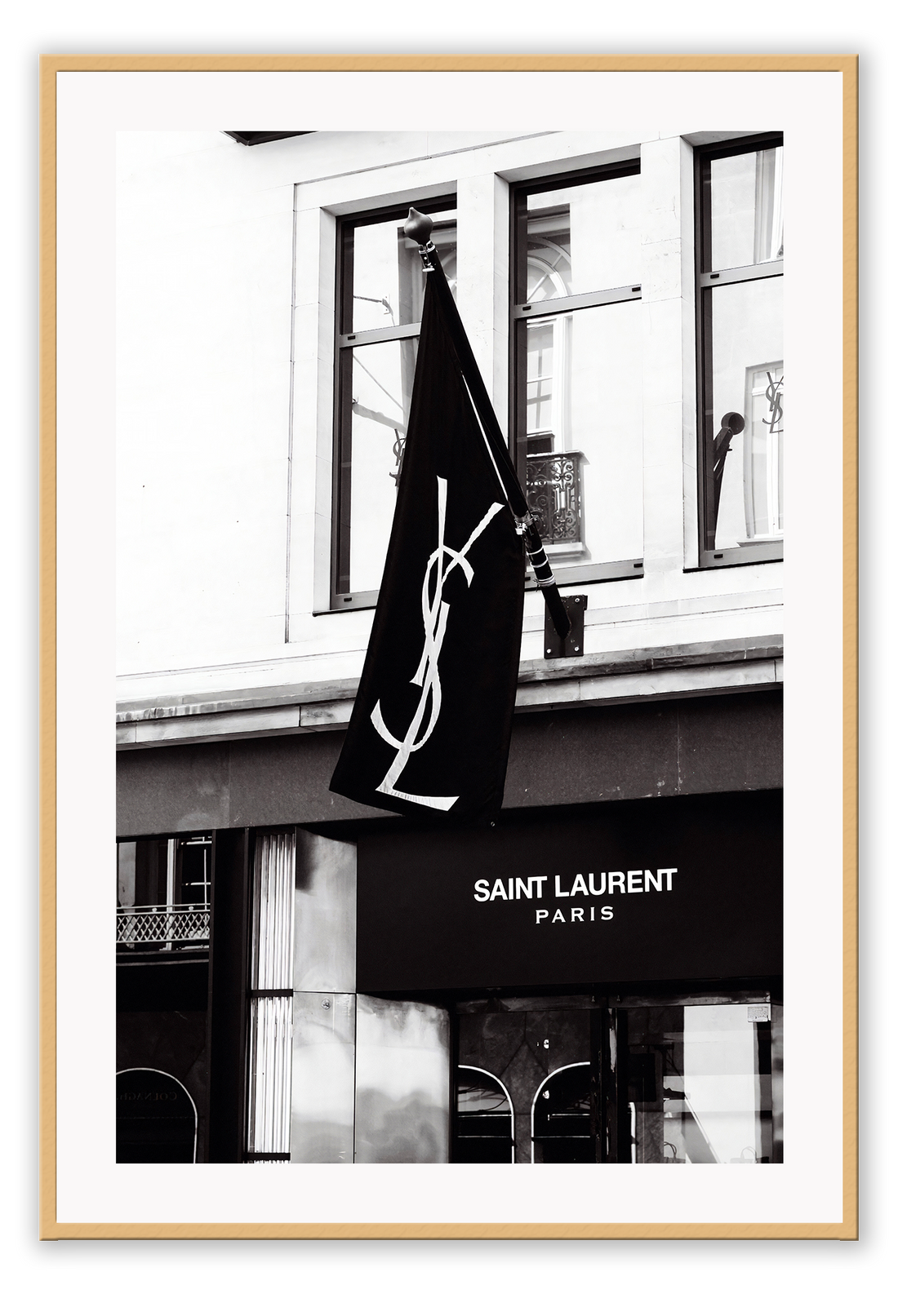 A black and white wall art with iconic Yves Saint Laurent Bond Street shop in London 