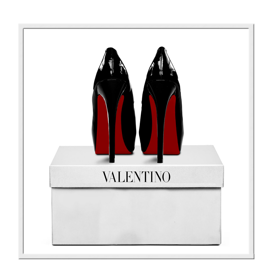 Square photography of red bottom black heels on top of a white valentino box on a white background  