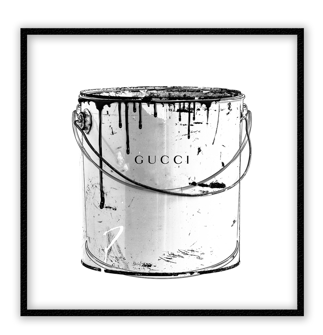 A black and white fashion wall art with a paint jug and Gucci fashion label wrinting on it. 