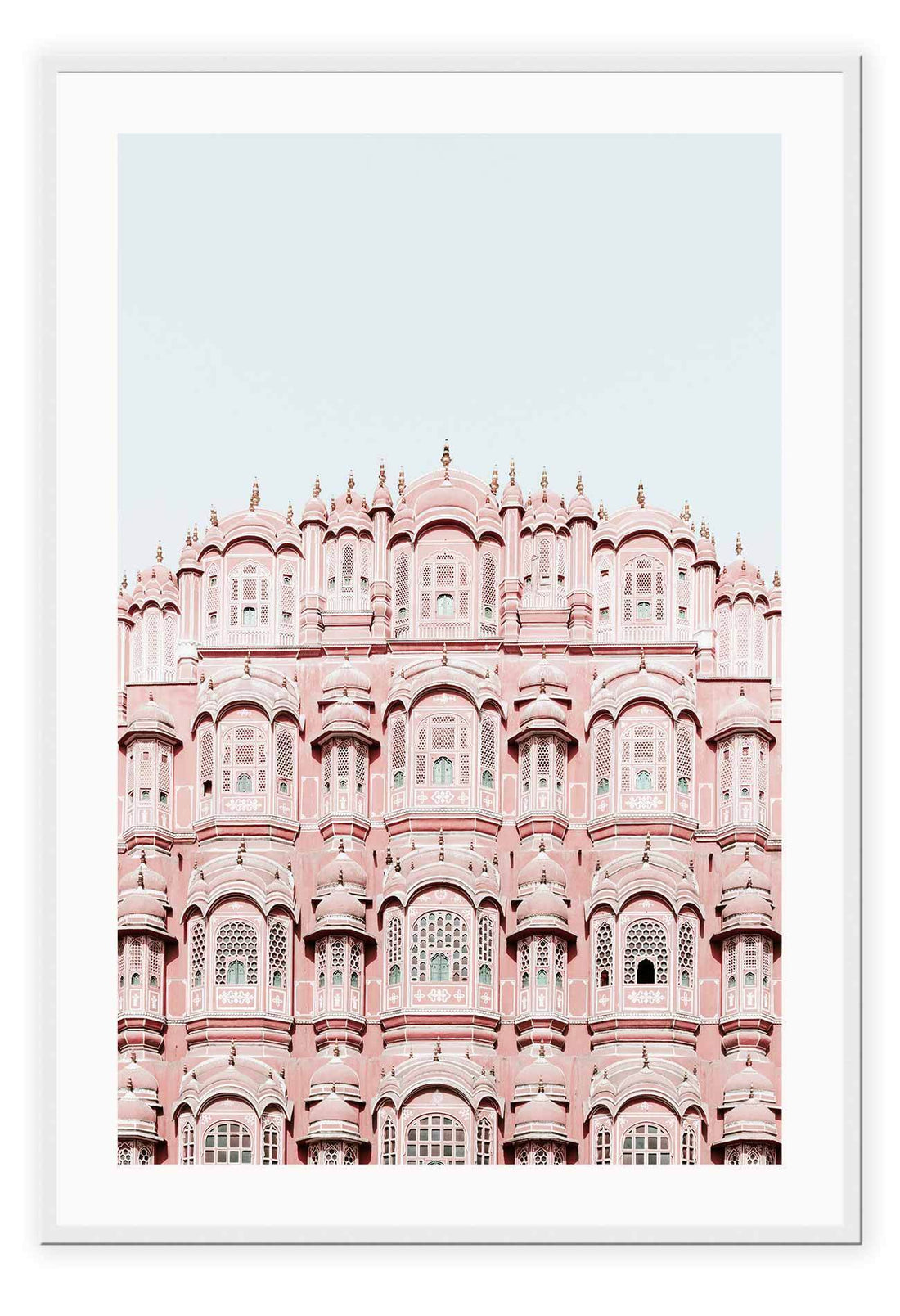 An urban wall art with pink indian architecture masterpiece. 