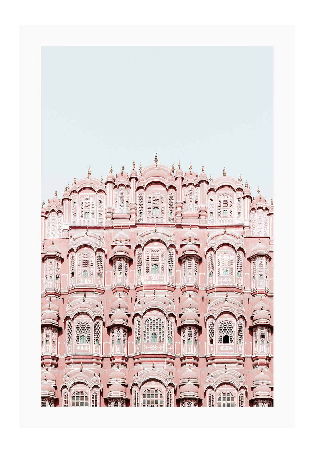 An urban wall art with pink indian architecture masterpiece. 