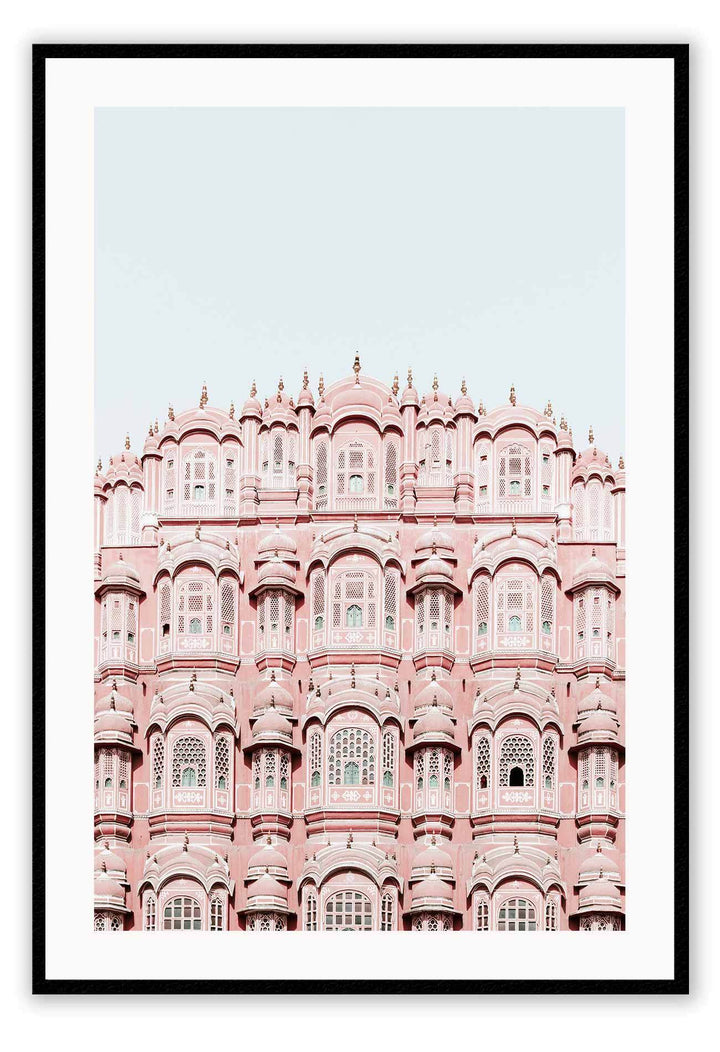 An urban wall art with pink indian architecture masterpiece. 